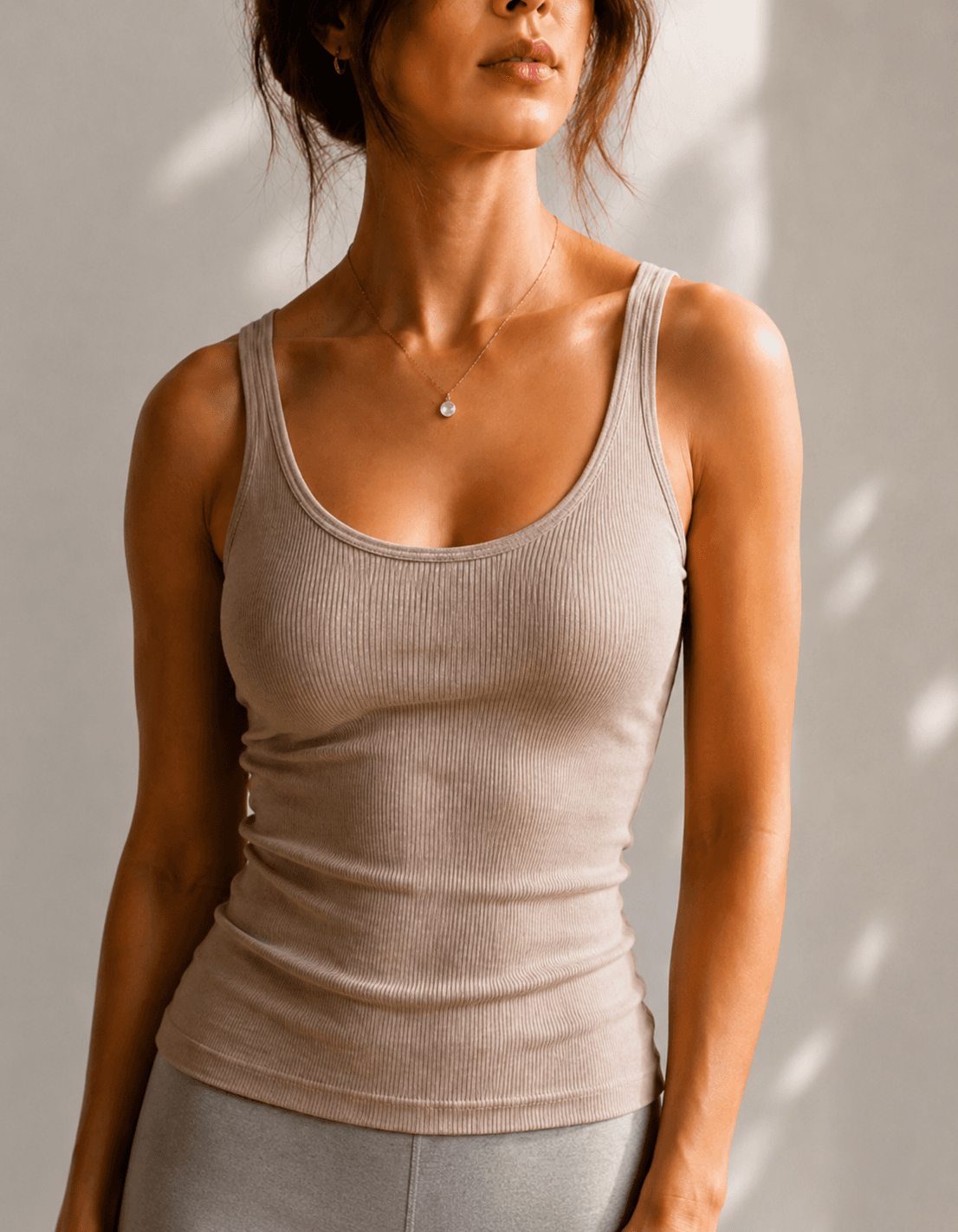 Female upper-body portrait for body contour service reference.